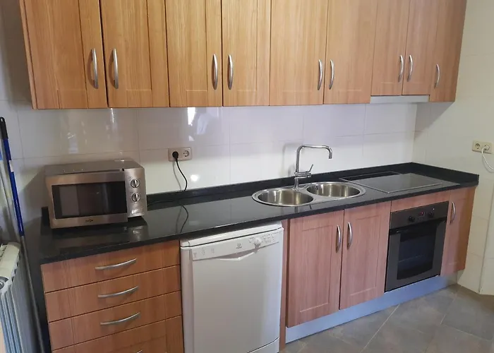Apartamentos Farrai llova