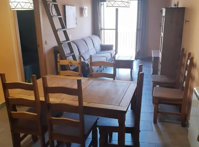 Apartamentos Farrai llova