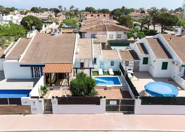 Agustina - Casa adosada en Riumar con jardín, barbacoa y cerca del mar - Deltavacaciones
