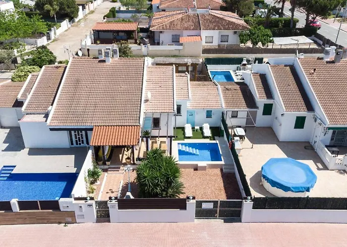 Agustina - Casa adosada en Riumar con jardín, barbacoa y cerca del mar - Deltavacaciones